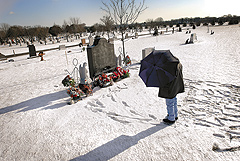 Mr. Snelius at his wife's grave